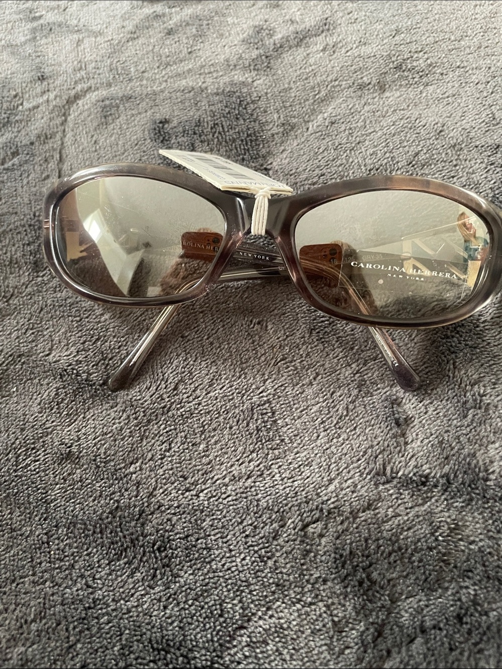Carolina Herrera Women's Translucent Brown Oval Sunglasses
